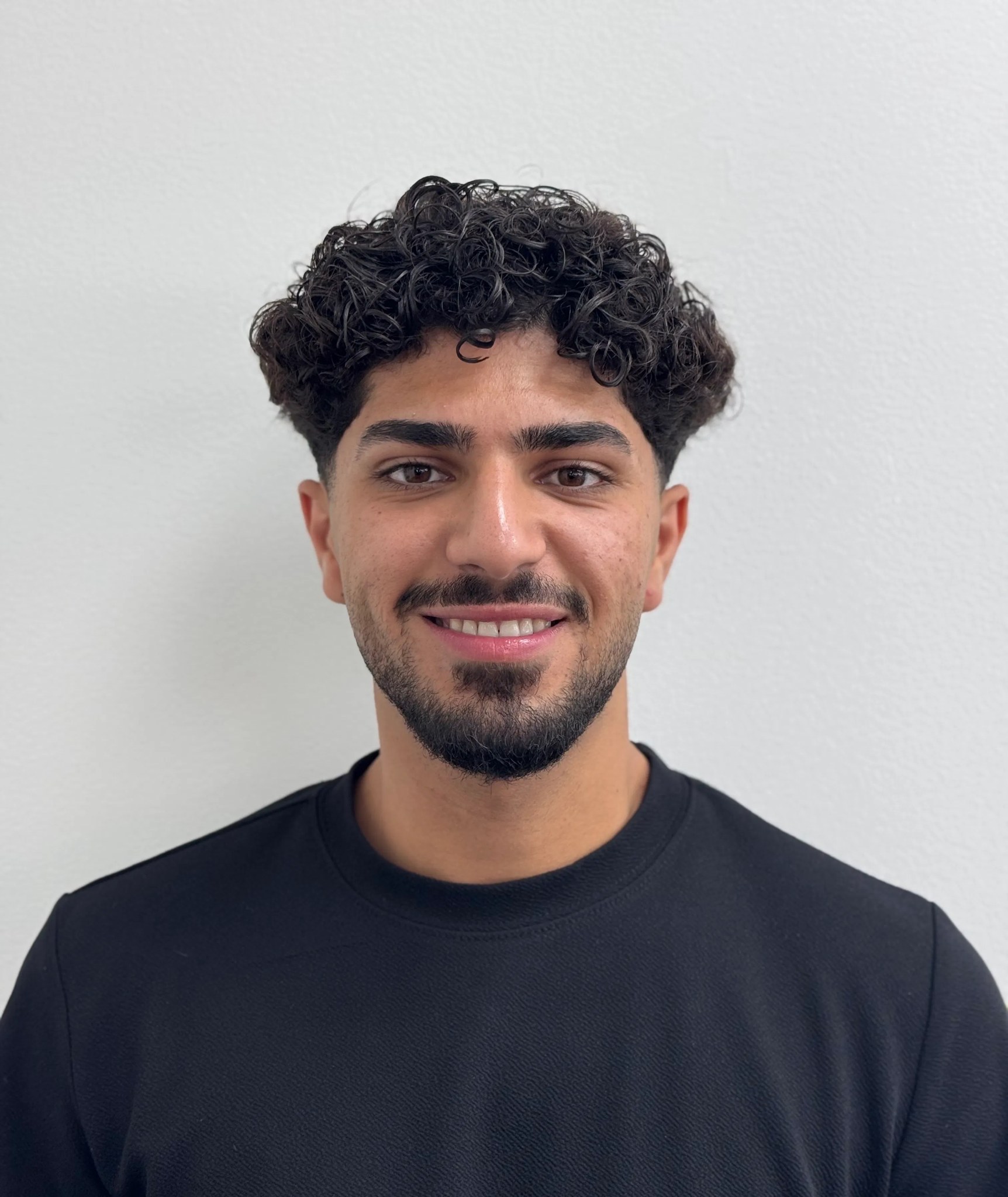 Aref, barbier bij Barbershop Joudi